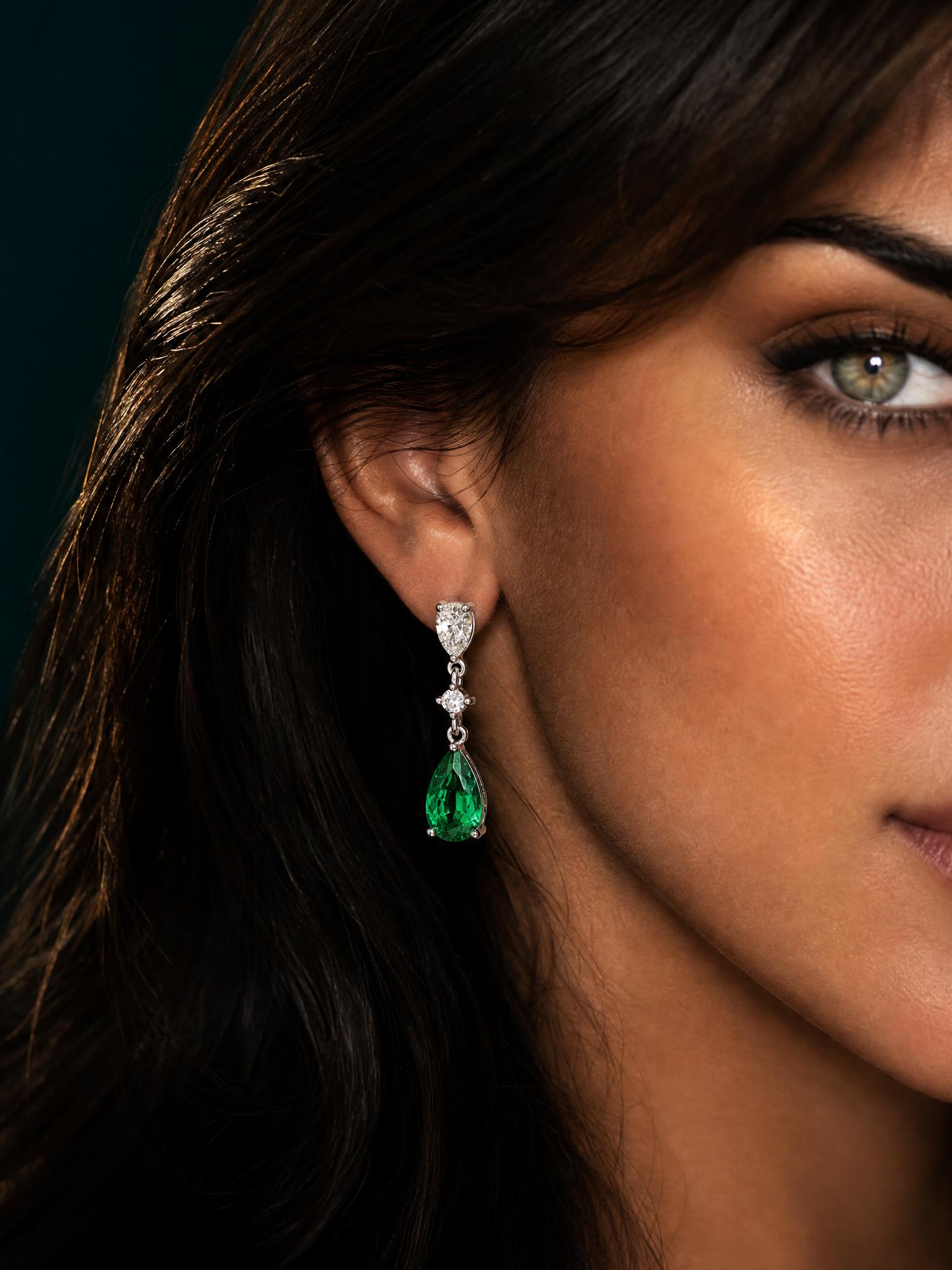 Luxury Italian jewelry portrait with emerald and diamond earring